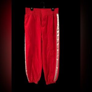 Red Track Pants with White Stripes